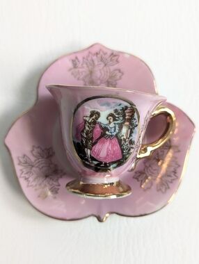 Vintage Royal Crown Porcelain Teacup & Saucer Courting Couple Pink Iridescent